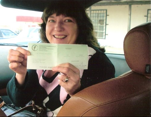 Roberta Kirby holding big check!